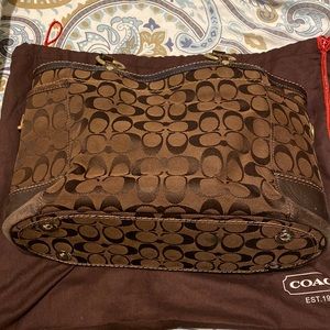 Brown coach purse.